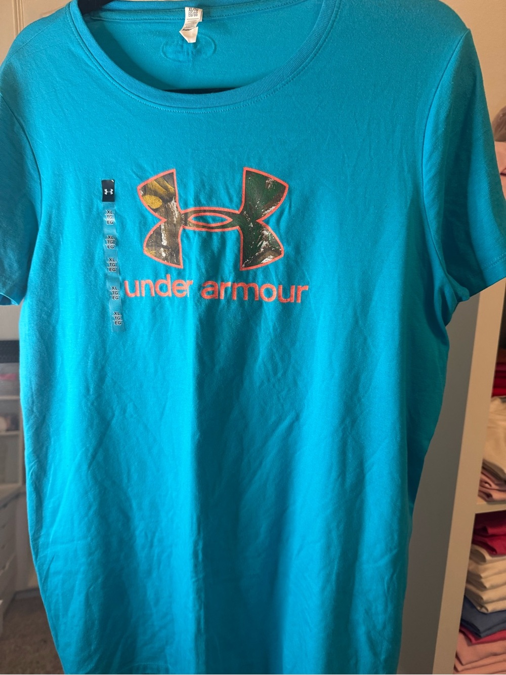 Under Armour Kids Turquoise Tee with Neon Orange Logo Outline
